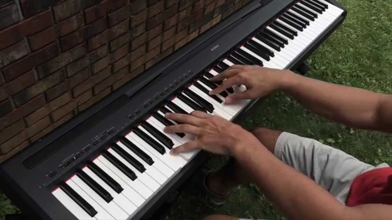 Austin playing Reminisce outdoors